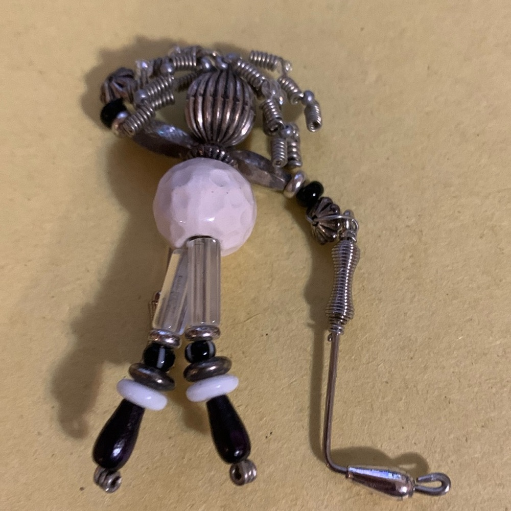 Unique stick pin of a golfer